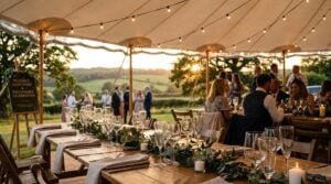 Disposable champagne flutes and reusable polycarbonate wedding glasses at an outdoor UK wedding reception
