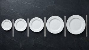 Restaurant plate sizes guide showing five commercial plate types from 15cm to 32cm used in UK hospitality